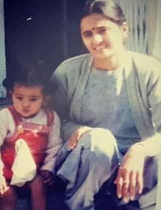Surveen chawla childhood photo